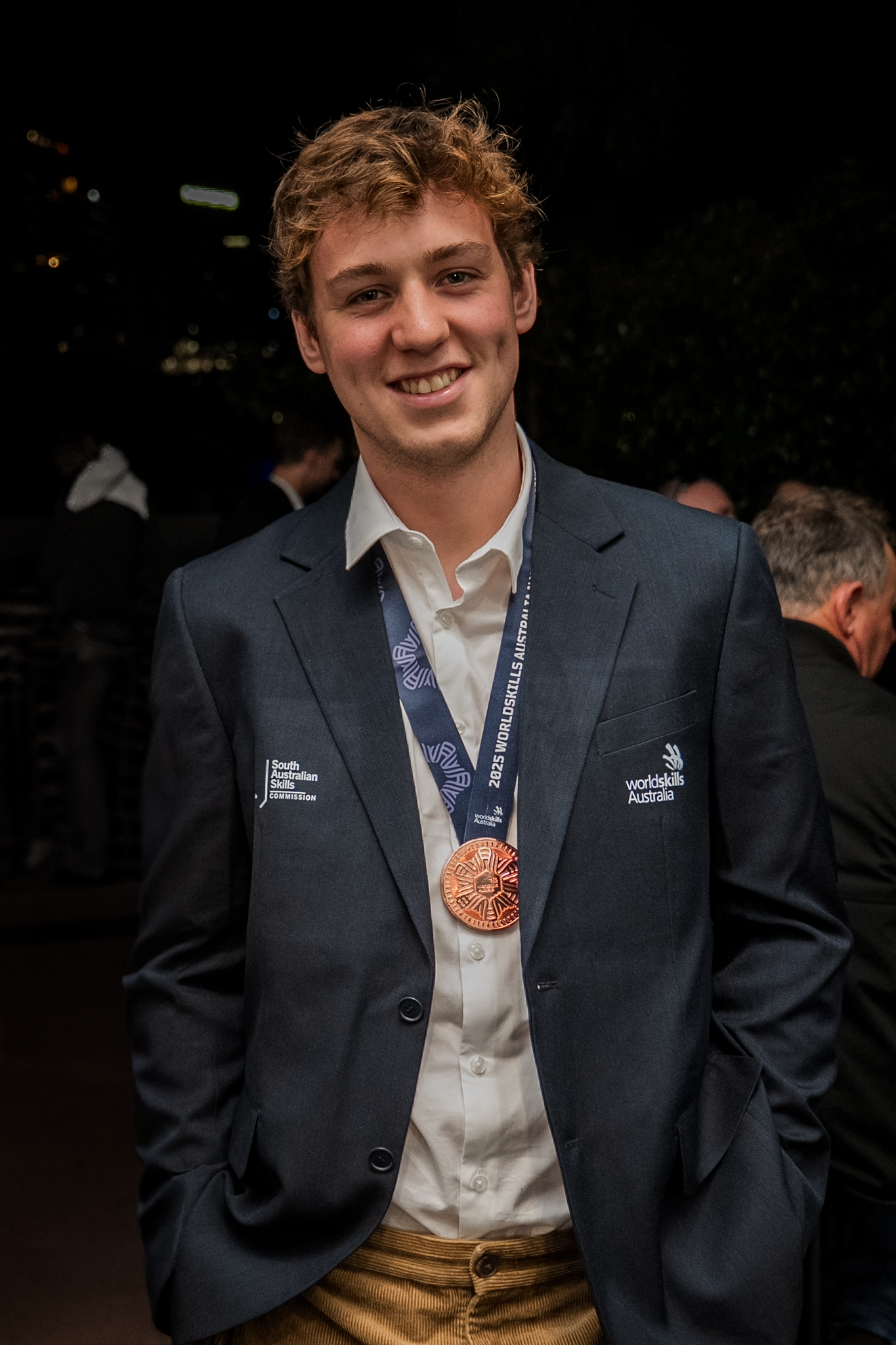 Oliver Anthonysz Wall and Floor Tiling post ceremony Bronze